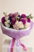 IN𝓃 Floral Studio Lavender Blush Garden Bouquet featuring roses, dahlias, and hydrangeas in purple and pink tones.