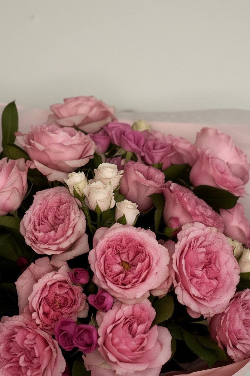 IN𝓃 Floral Studio Pink Garden Whisper bouquet, size L, featuring premium pink garden roses, spray roses, white blooms, and greenery, wrapped in blush paper with satin ribbon.